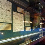 Charles Dickens artifacts - books, notes, and other items.