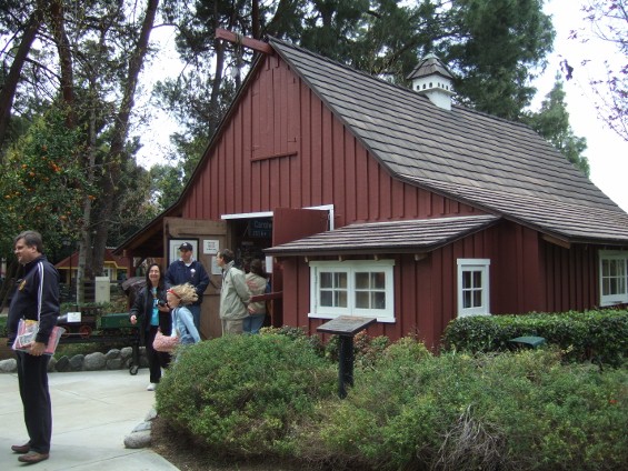 Curator Nathan Eick greets visitors at the door to the Barn