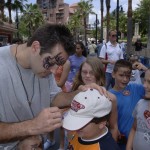 NFL QUARTERBACK KURT WARNER AT DISNEY WORLD WITH DOZENS OF CHILD