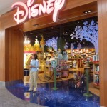 A Cast Member hosts the morning's store opening ceremony.