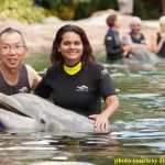 Survivor Player Yau-Man Chan and two-time winner Sandra Diaz-Twine with Dexter, at Discovery Cove in Orlando