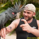Survivor Villain Russell Hantz meets Discovery Cove's black palm cockatoo, Torre