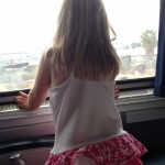 DL No Car Happy Child on Amtrak